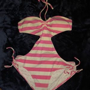 Authentic Pink one piece cut out bathing suit.
